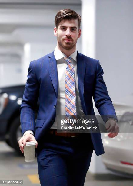 Conor Garland of the Vancouver Canucks walks to the Canucks dressing room before their NHL game against the Dallas Stars at Rogers Arena March 14,...