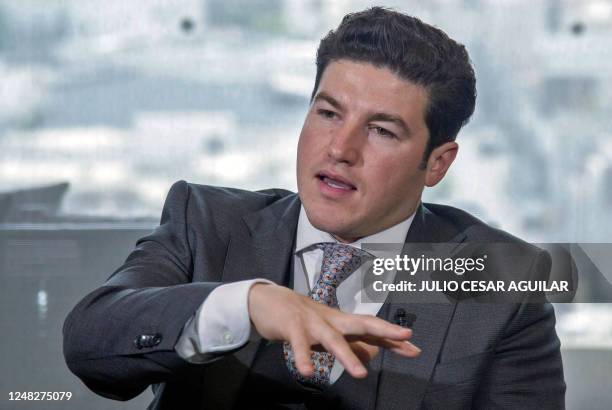 The governor of the Mexican state of Nuevo Leon, Samuel Garcia, talks during an interview with AFP about plans by American electric car maker Tesla...