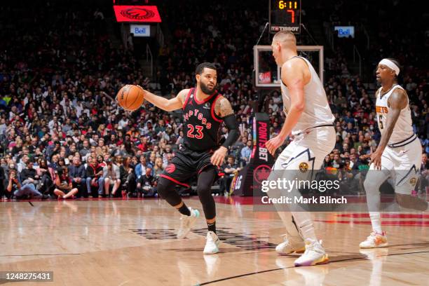 Fred VanVleet of the Toronto Raptors dribbles the ball against the Denver Nuggets on march 14, 2023 at the Scotiabank Arena in Toronto, Ontario,...