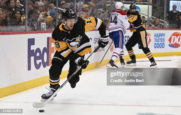 Alex Nylander of the Pittsburgh Penguins skates with the puck in the third period during the game against the Montreal Canadiens at PPG PAINTS Arena...
