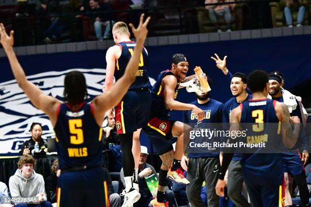 March 14:Trevon Duval ansd Jack White of the Grand Rapids Gold celebrates with team against Raptors 905 on March 14, 2023 at the Van Andel Arena in...