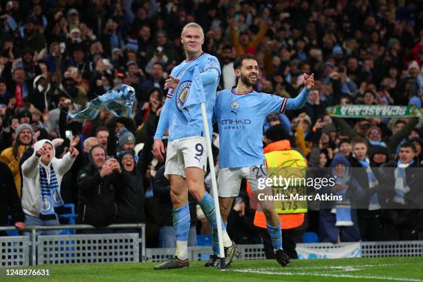 Erling Haaland of Manchester City celebrates scoring his 2nd goal with Bernardo Silva during the UEFA Champions League round of 16 leg two match...