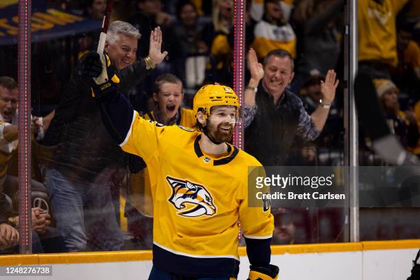 Tommy Novak of the Nashville Predators celebrates his goal against the Detroit Red Wings during the third period at Bridgestone Arena on March 14,...