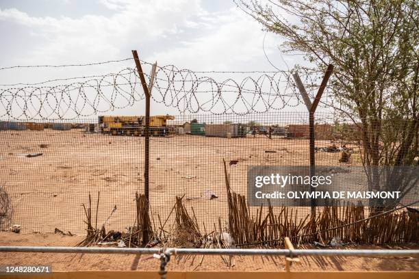 Barbed wire fences surround the Cominak mine near Arlit on March 8, 2023. - The Akouta Mining Company , operated in the town of Akokan near Arlit by...