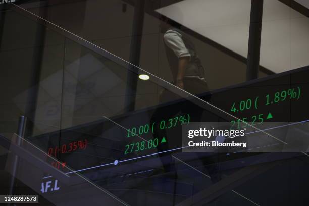 Multiple exposures were combined in camera to produce this image. Stock price information displayed in the London Stock Exchange Group Plc's office...