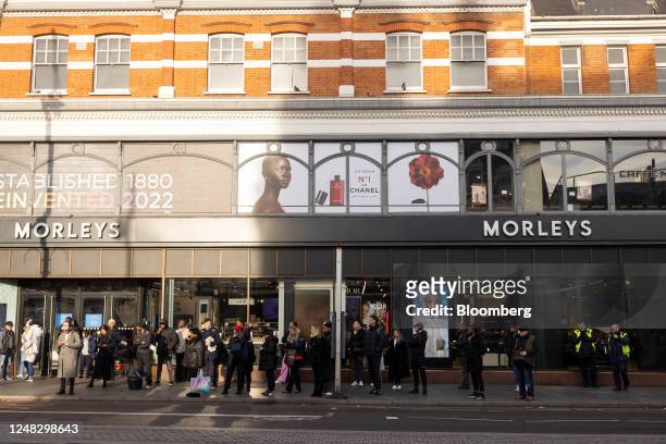 Commuters wait for a bus near Brixton Station during a strike by London Underground workers in London, UK, on Wednesday, March 15, 2023. About half a...