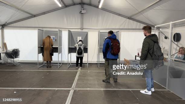 Citizens living in the Netherlands cast their votes at a polling station during the State Assembly elections in Schiedam, Netherlands on March 15,...