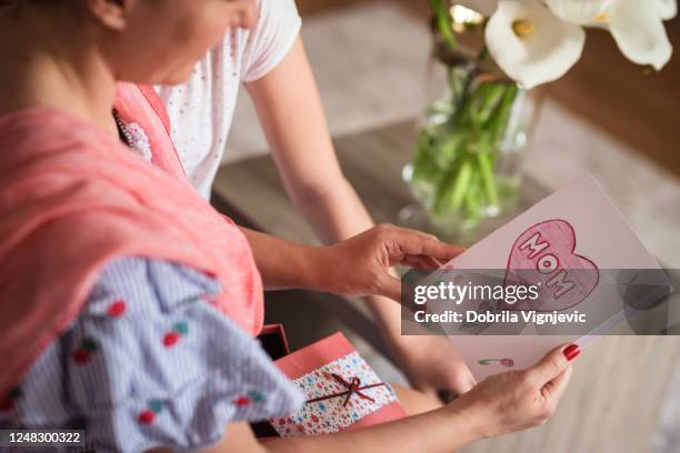 looking at mother's day card - i love you card stock pictures, royalty-free photos & images