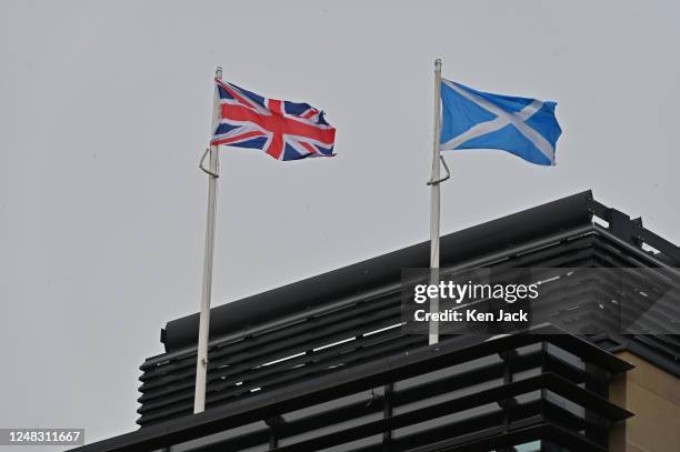 The union flag and the Scottish saltire fly above Queen Elizabeth House, the UK Government's headquarters in Scotland, as civil service unions take...