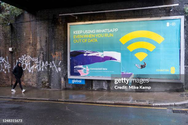 Poster for the mobile phone and telephone service provider brand EE advertising that you can still access WhatsApp even if you have run out of phone...