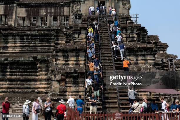 Tourists are lining up to tour the ruins at Angkor Wat in Cambodia on March 9th.