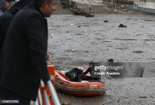 Police divers, also known as frogmen, of Turkish Police Department conduct search and rescue operations at the flooded crossroads after downpour hit...