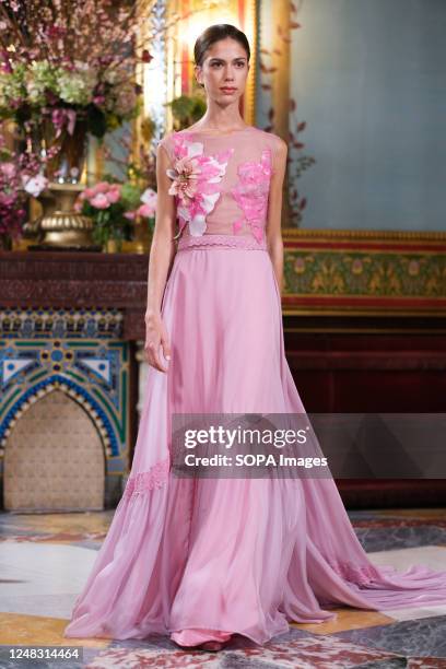 Model showcases creations by Susana Hidalgo during the Atelier Couture bridal catwalk within Madrid Fashion Week, at Santa Isabel Palace in Madrid.