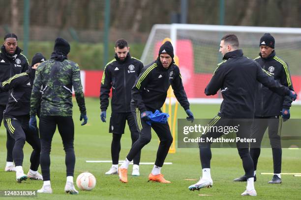 Raphael Varane of Manchester United in action with team-mates during a Manchester United first team training session at Carrington Training Ground...