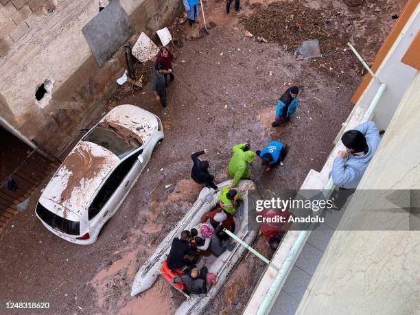 Police divers, also known as frogmen, of Turkish Police Department conduct search and rescue operations at the flooded crossroads after downpour hit...