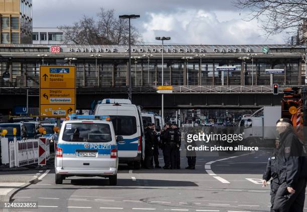 March 2023, Berlin: Police emergency vehicles are parked in the area closed to traffic at the Waldorf Astoria hotel at Bahnhof Zoo. Israeli Prime...