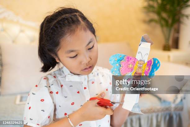 children make handicrafts - draw a butterfly stock pictures, royalty-free photos & images