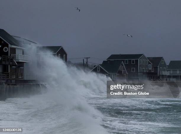 Scituate, MA Waves crash into homes on Turner Road during a NorEaster.