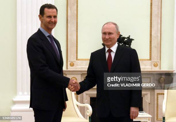 Russian President Vladimir Putin meets with his Syrian counterpart Bashar al-Assad at the Kremlin in Moscow on March 15, 2023.