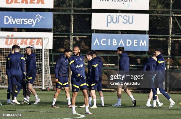 Petro , Serdar Dursun and goalkeeper Altay Bayindir of Fenerbahce attend a training session ahead of the UEFA Europa League tour 16 match between...