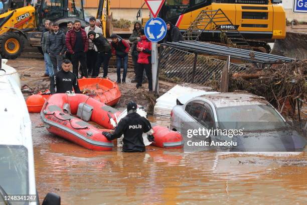 Teams work on the flooded street in Akabe neighborhood, due to floods in Sanliurfa, Turkiye on March 15, 2023. Efforts are being made to evacuate...