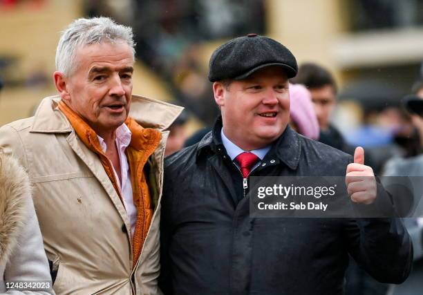 Gloucestershire , United Kingdom - 15 March 2023; Owner Michael O'Leary and trainer Gordon Elliott, right, after winning the Glenfarclas Cross...