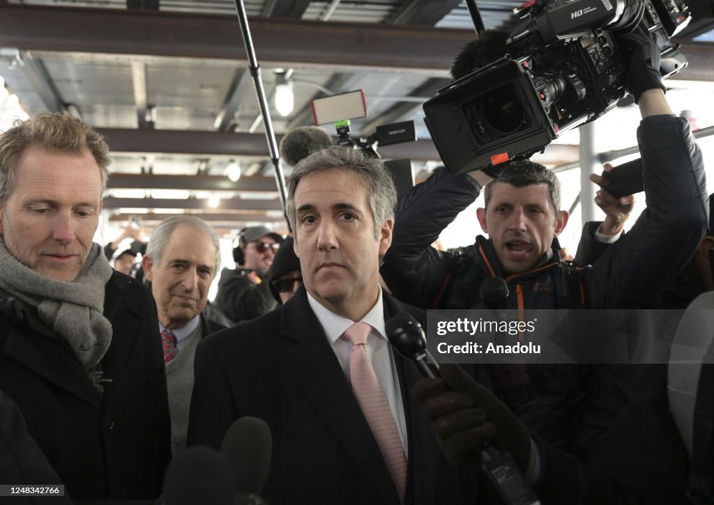 Michael Cohn Michael Cohen , Donald Trump's former lawyer and fixer, walks out of ...