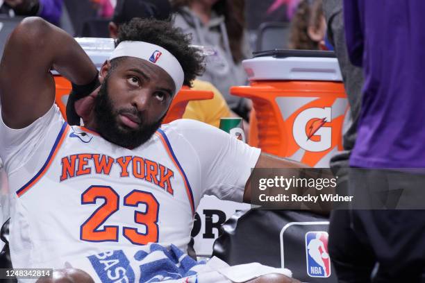 Mitchell Robinson of the New York Knicks looks on during the game against the Sacramento Kings on March 9, 2023 at Golden 1 Center in Sacramento,...