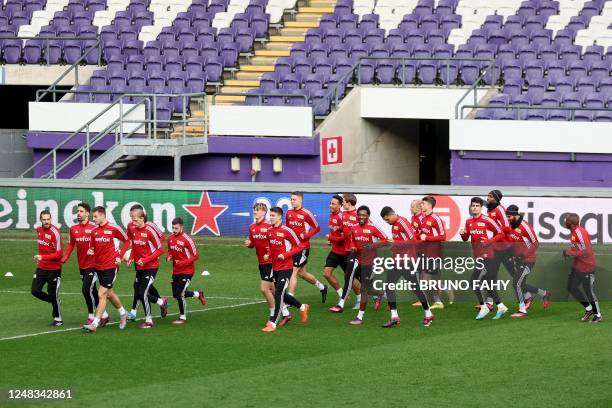 Union Berlin players attend a training session in Anderlecht, on March 15 on the eve of their UEFA Europa League last 16 first leg football match...