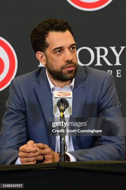 Landry Fields of the Atlanta Hawks introduce Quinn Snyder during a press conference on February 27, 2023 at State Farm Arena in Atlanta, Georgia....