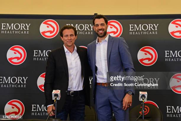 Landry Fields of the Atlanta Hawks poses for a photo with Quinn Snyder during a press conference on February 27, 2023 at State Farm Arena in Atlanta,...