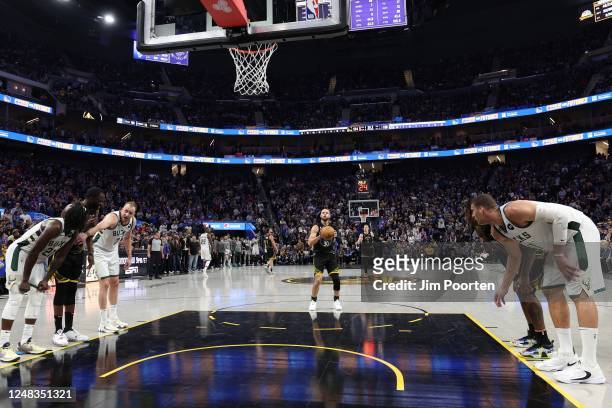 Stephen Curry of the Golden State Warriors prepares to shoot a free throw during the game against the Milwaukee Bucks on March 11, 2023 at Chase...