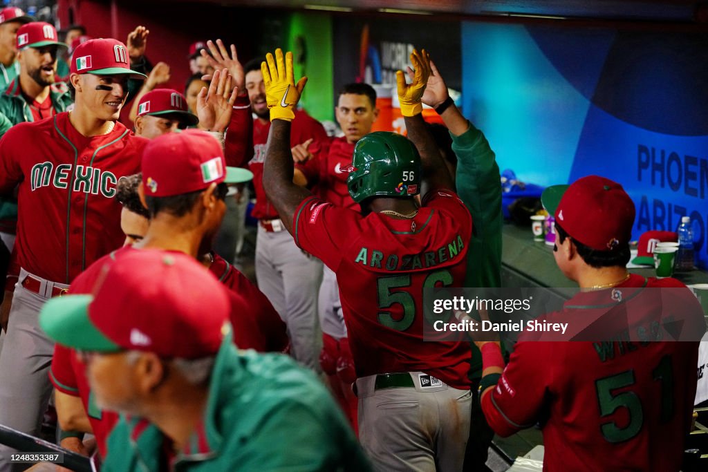Mexico Randy Baseball Randy Arozarena of Team Mexico is greeted in the dugout after scoring ...