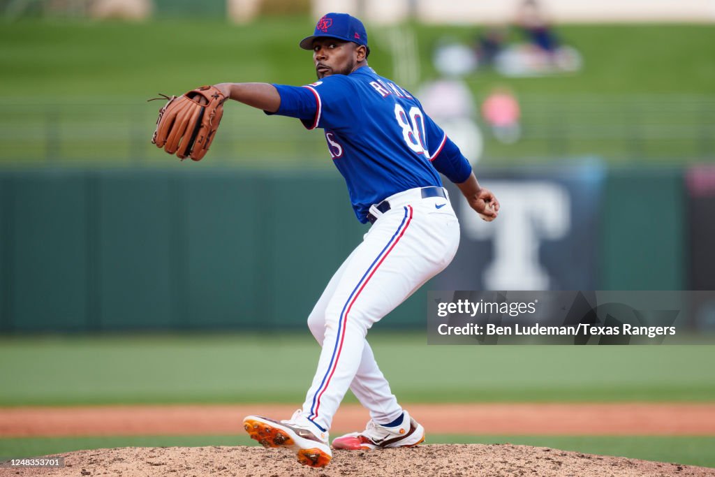 Texas Spring Training Kumar Rocker of the Texas Rangers delivers a pitch during a spring ...