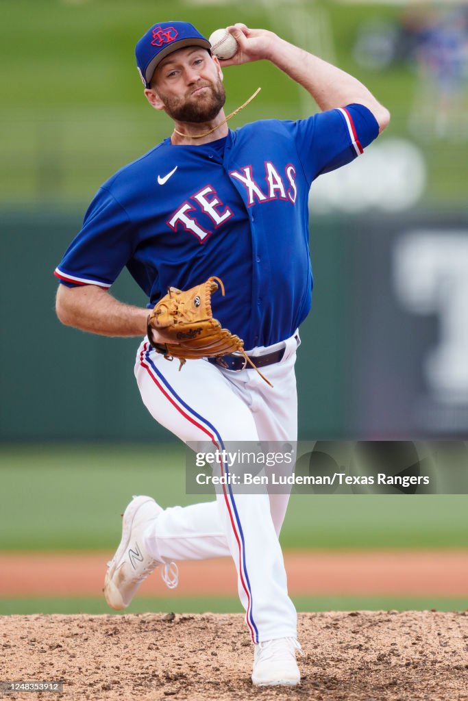 Texas Spring Training Lucas Jacobsen of the Texas Rangers delivers a pitch during a spring ...