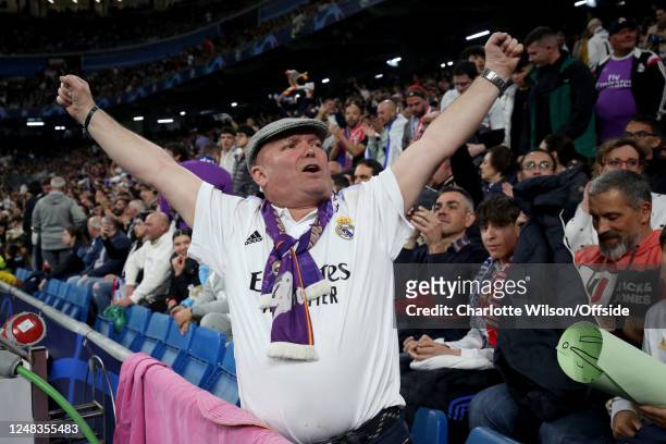 A Real Madrid supporter celebrates during the UEFA Champions League round of 16 leg two match between Real Madrid and Liverpool FC at Estadio...