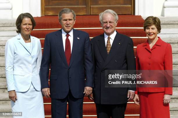 President George W. Bush and First Lady Laura Bush pose for a photo with German President Johannes Rau and his wife Christina at Bellevue Palace 23...