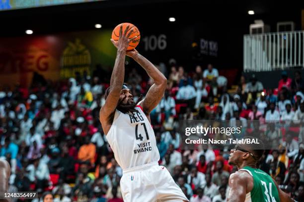Delwan Graham of REG shoots the ball during the game against the AS Douanes on March 15, 2023 at the Dakar Arena in Dakar, Africa. NOTE TO USER: User...