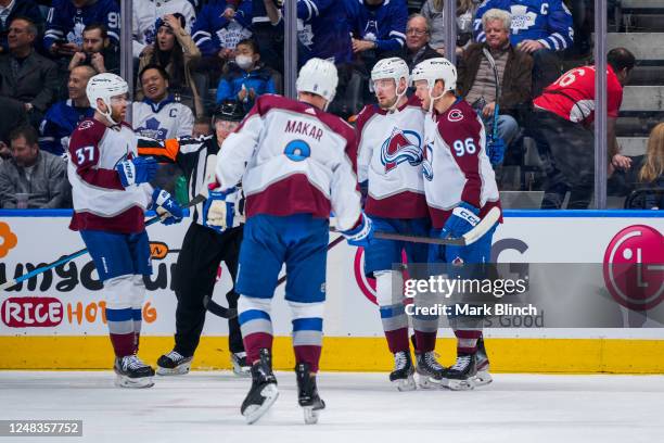 Mikko Rantanen of the Colorado Avalanche celebrates his goal against the Toronto Maple Leafs with teammates J.T. Compher, Cale Makar and Valeri...