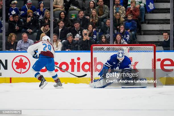 Nathan MacKinnon of the Colorado Avalanche scores against Ilya Samsonov of the Toronto Maple Leafs during a shootout at the Scotiabank Arena on March...