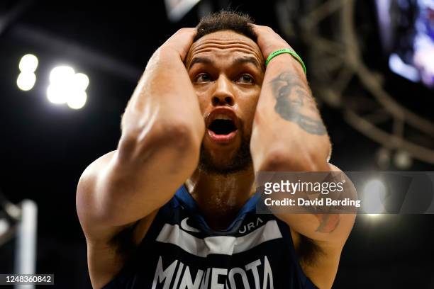 Kyle Anderson of the Minnesota Timberwolves reacts to his foul against the Boston Celtics in the fourth quarter of the game at Target Center on March...