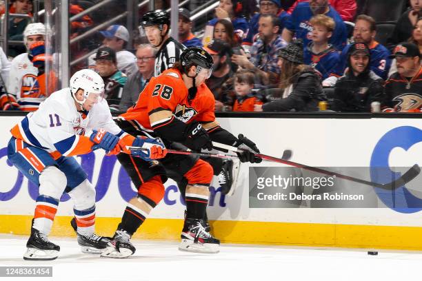 Zach Parise of the New York Islanders and Nathan Beaulieu of the Anaheim Ducks battle for the puck during the second period at Honda Center on March...