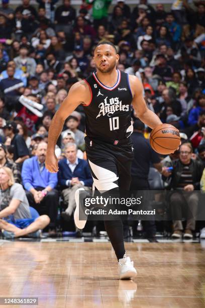 Eric Gordon of the LA Clippers moves the ball during the game against the Golden State Warriors on March 15, 2023 at Crypto.Com Arena in Los Angeles,...