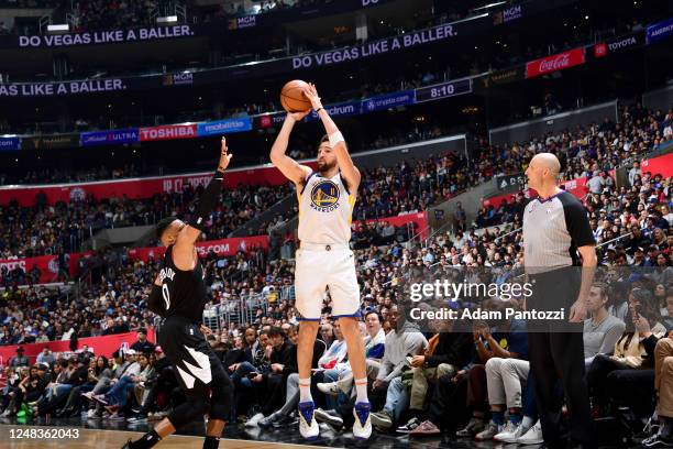 Klay Thompson of the Golden State Warriors shoots a three point basket during the game against the LA Clippers on March 15, 2023 at Crypto.Com Arena...