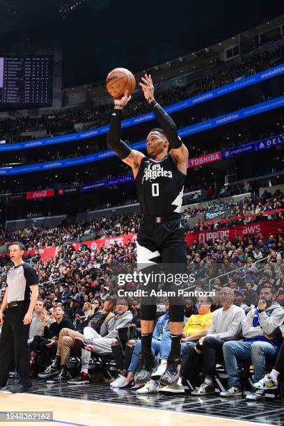 Russell Westbrook of the LA Clippers shoots a three point basket during the game against the Golden State Warriors on March 15, 2023 at Crypto.Com...