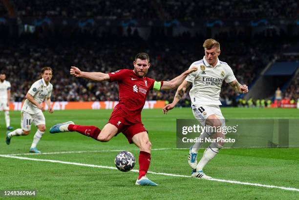 James Milner and Toni Kroos during UEFA Champions League match between Real Madrid and Liverpool FC at Estadio Santiago Bernabeu on March 15, 2023 in...