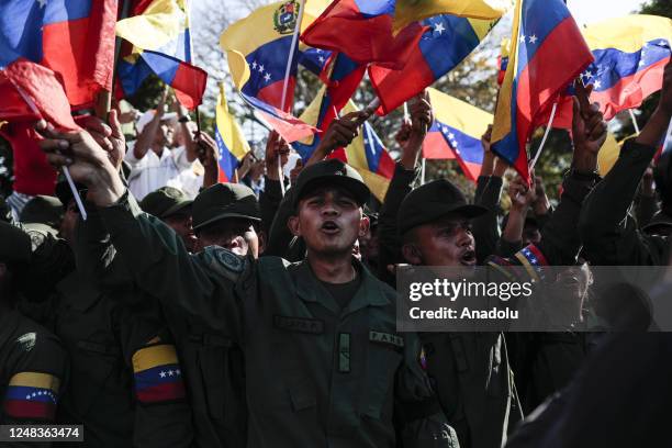 Chavismo supporters attend a caravan to take "the Cadet's Saber" from the Military Academy, located in Fort Tiuna, to Cuartel de la Montana to...