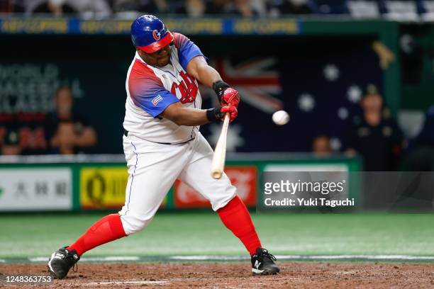 Alfredo Despaigne of Team Cuba is out on a sacrifice fly in the fifth inning during the 2023 World Baseball Classic Quarterfinal game between Team...