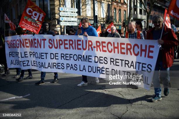 Banner reads 'Universities, reasearch, withdrawal of the planned reform, raise wages not retirement age'. France's labour unions and left parties led...