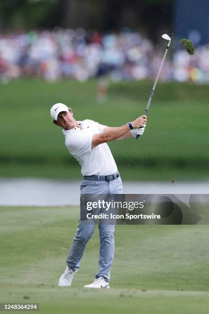 Rory McIlroy of Northern Ireland hits his second shot from the fairway at the 6th hole during the first round of THE PLAYERS Championship on THE...